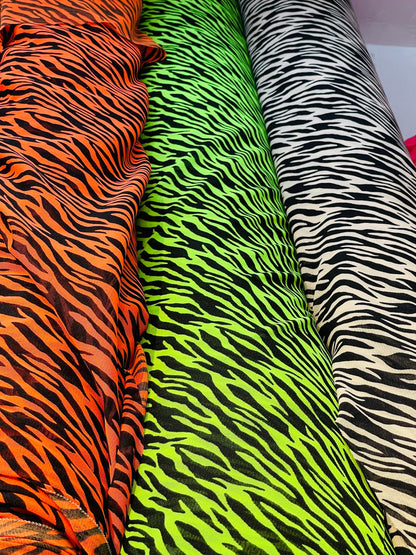 New Exotic Zebra design print on great quality of stretch mesh 4-way 58/60” Sold by the YD. Ships Worldwide from Los Angeles California USA.