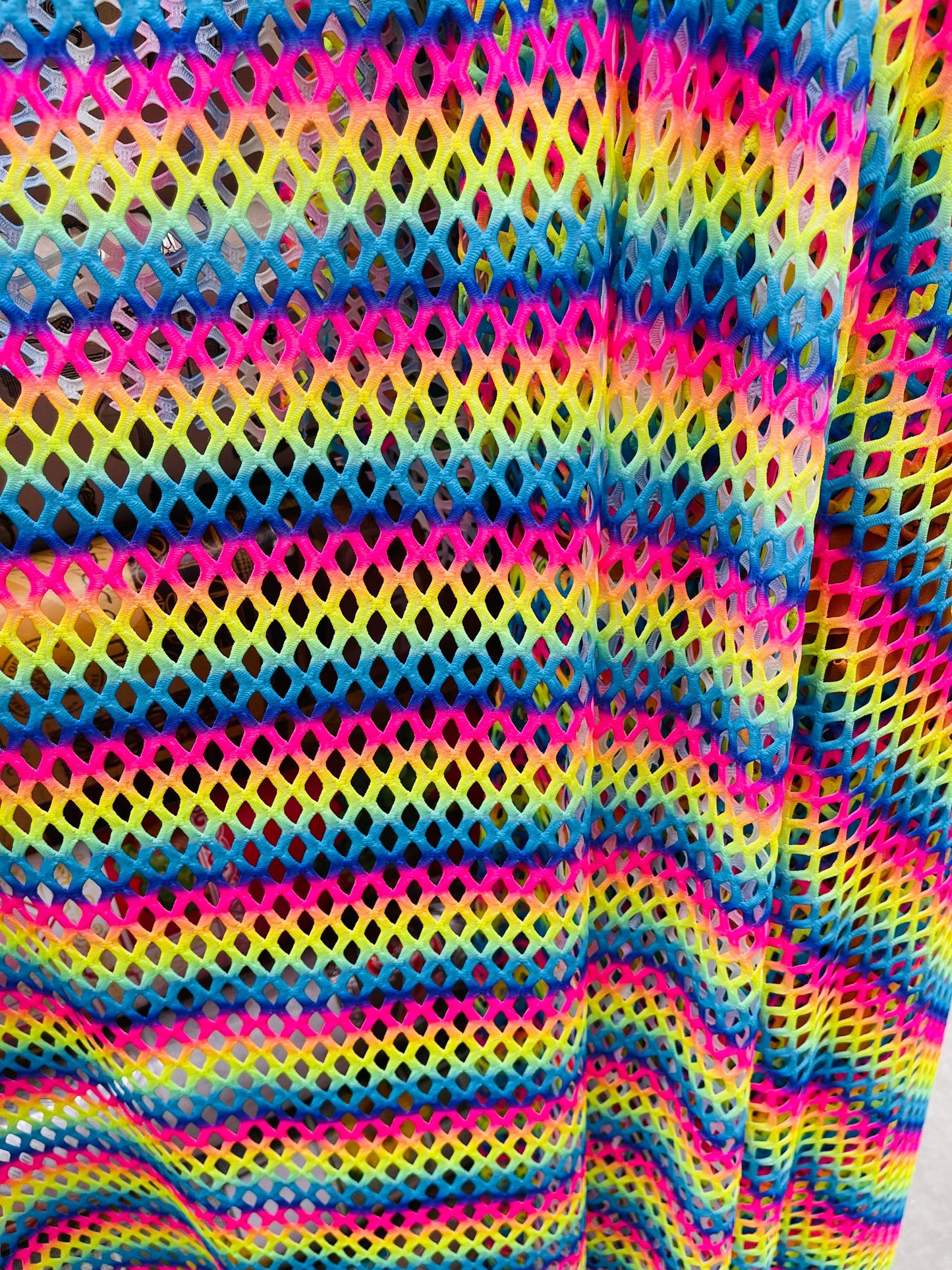 New Rainbow Diamond fishnet 4-way stretch 58/60” Sold by the YD. Ships Worldwide from Los Angeles California USA.