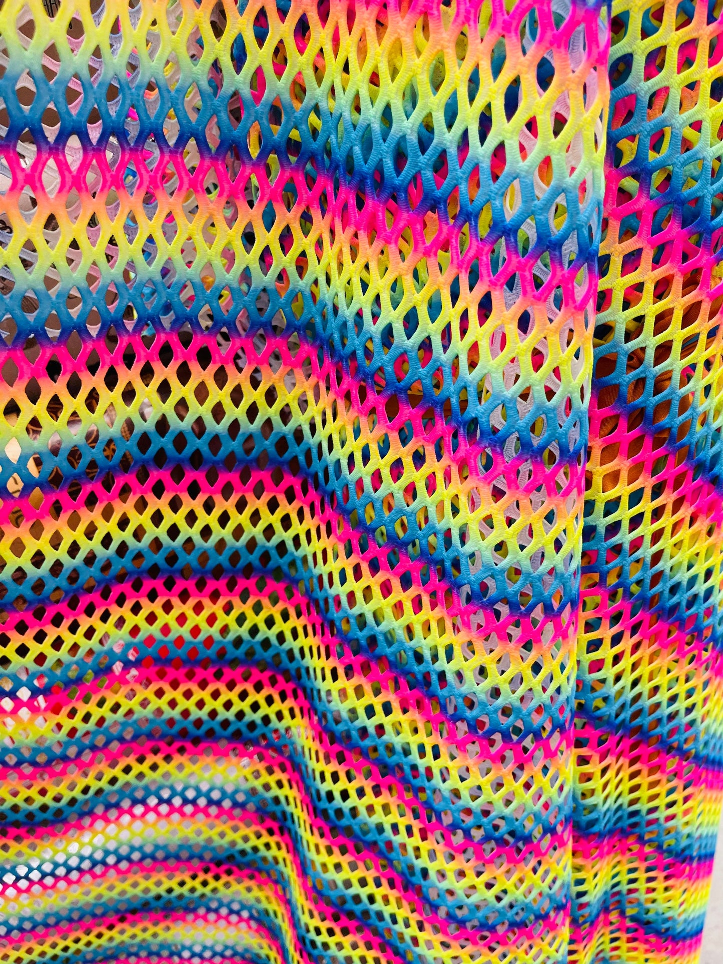 New Rainbow Diamond fishnet 4-way stretch 58/60” Sold by the YD. Ships Worldwide from Los Angeles California USA.