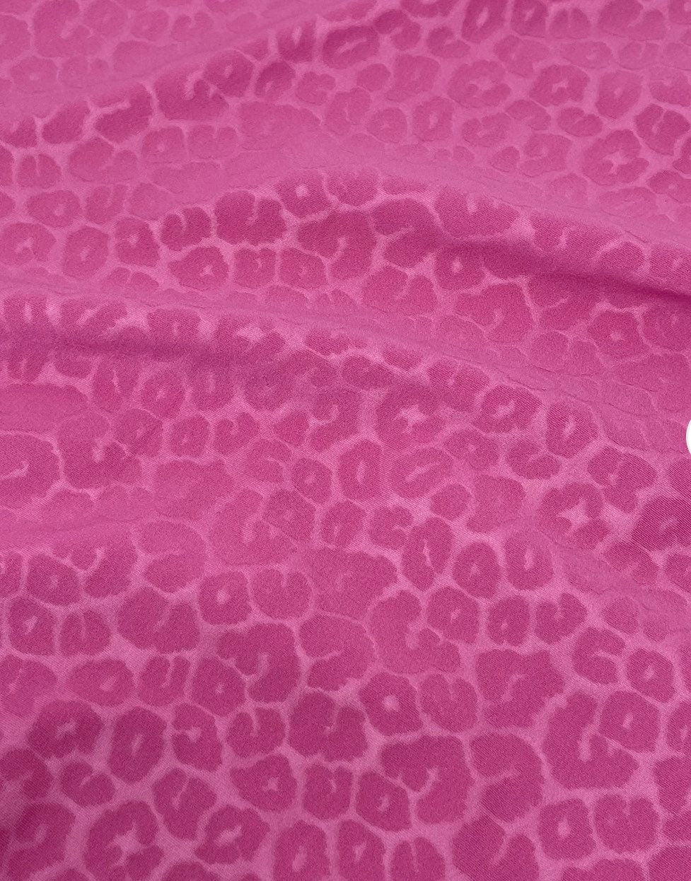 New Exotic Leopard design embossed nylon spandex 4-way stretch 58/60” Sold by the YD. Ships Worldwide from Los Angeles California USA.