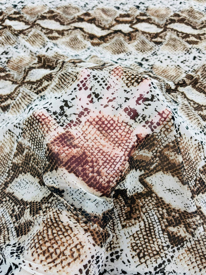 Exotic Snake design print of great quality of nylon power mesh 4-way stretch 58/60” Sold by the YD. Ships Worldwide from Los Angeles CA.