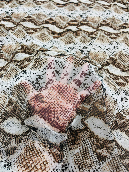 Exotic Snake design print of great quality of nylon power mesh 4-way stretch 58/60” Sold by the YD. Ships Worldwide from Los Angeles CA.