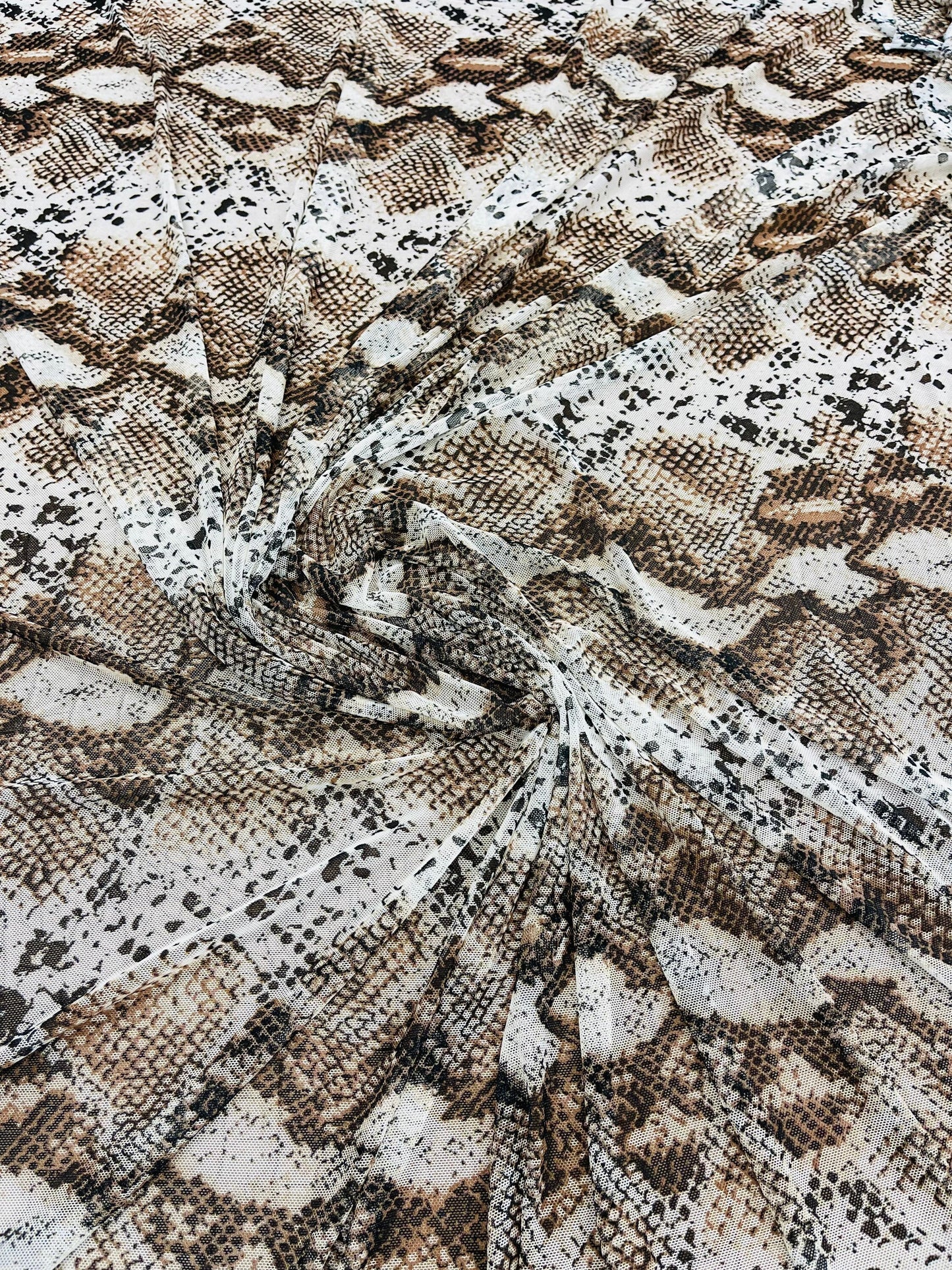 Exotic Snake design print of great quality of nylon power mesh 4-way stretch 58/60” Sold by the YD. Ships Worldwide from Los Angeles CA.