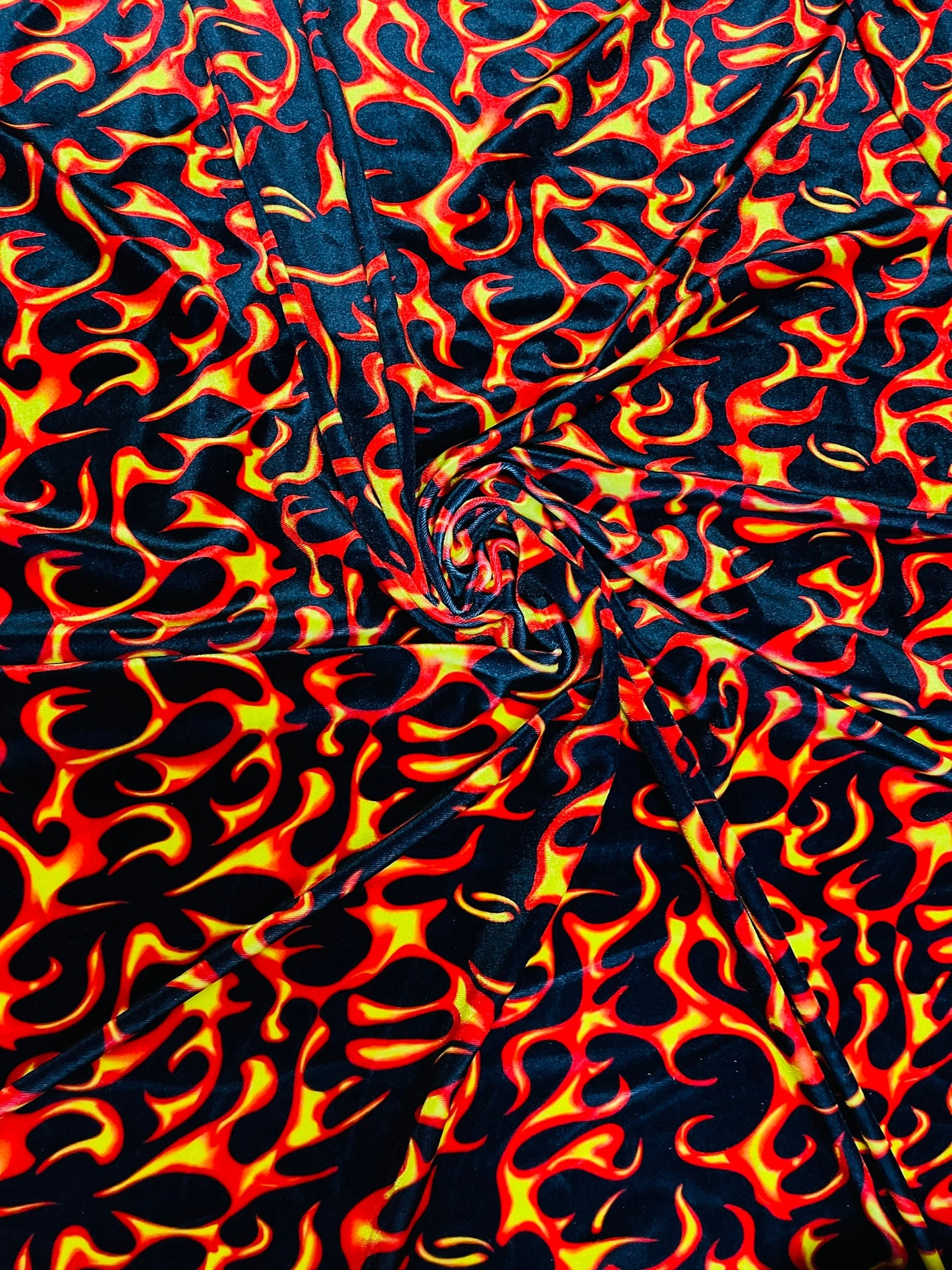 NEW Fire design Black/Red/Orange print on great quality of stretch velvet 4-way stretch 58/60” Sold by the YD. Ships Worldwide from L.A CA