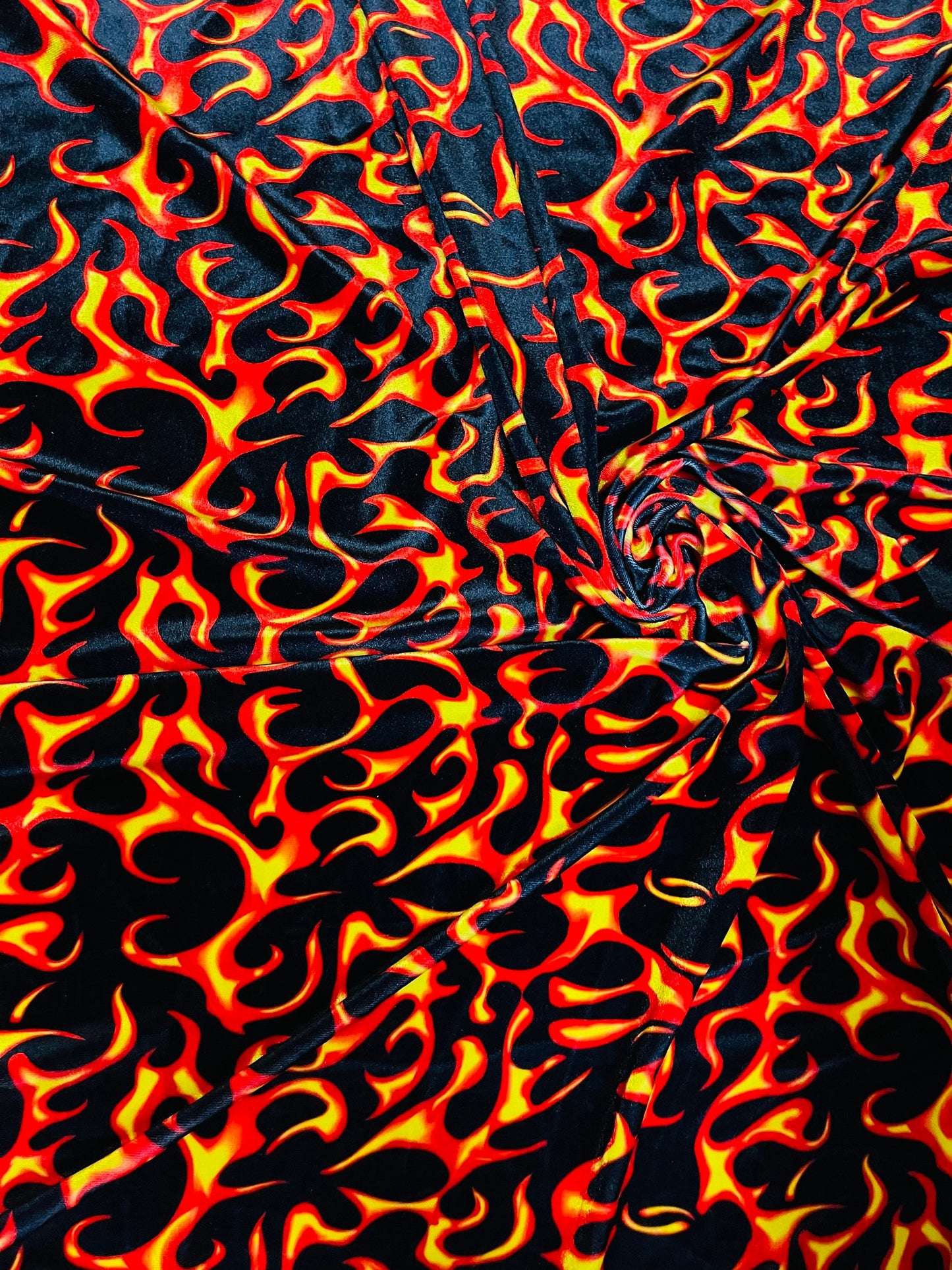 NEW Fire design Black/Red/Orange print on great quality of stretch velvet 4-way stretch 58/60” Sold by the YD. Ships Worldwide from L.A CA