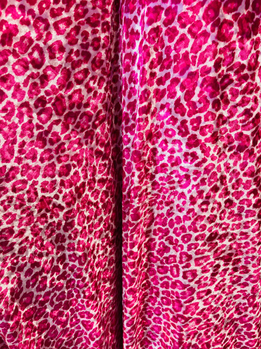 New Exotic Cheetah design pink color print on great quality of stretch velvet 4-way stretch 58/60” Sold by the YD. Ships Worldwide from L. A