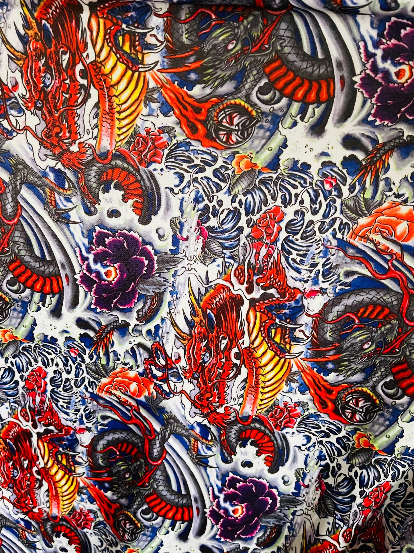 New Exotic Tattoo Dragon design Multicolor print on best quality of Nylon Spandex 4-way stretch 58/60” Sold by the YD. Ships Worldwide