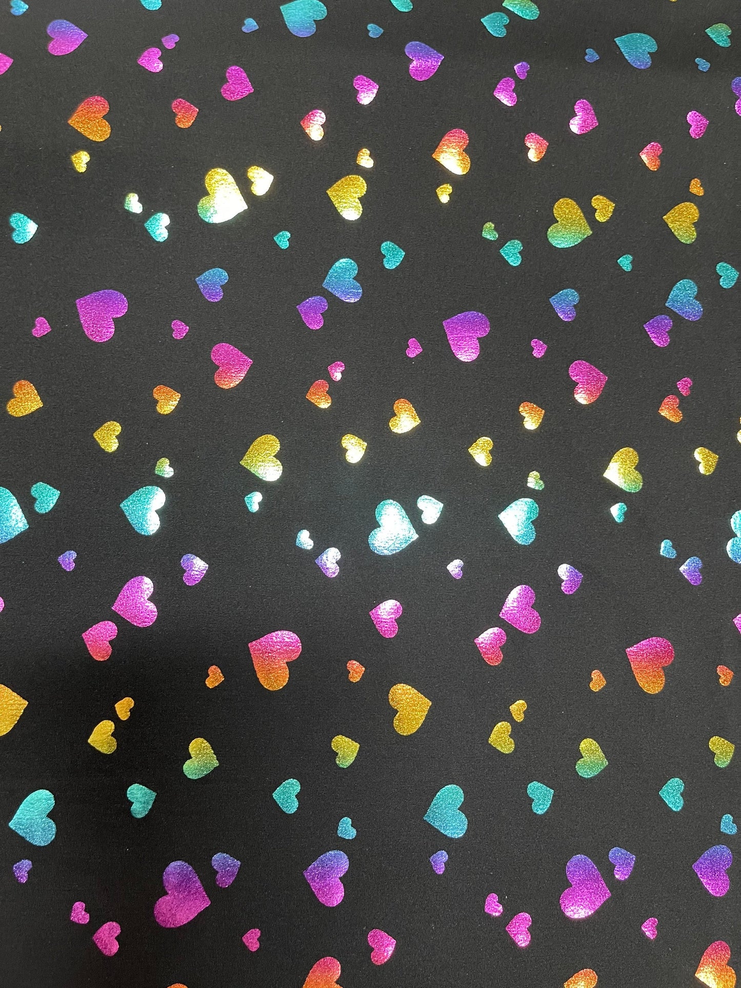 New Hearts design Black/Rainbow print on Nylon spandex 4-way stretch 58/60” Sold by the YD. Ships Worldwide from Los Angeles California USA.