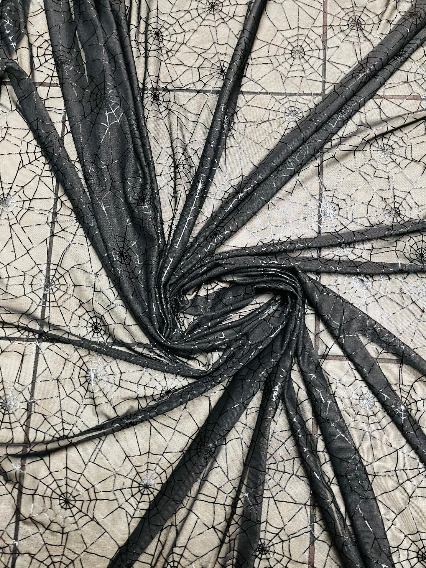 Spiderweb design metallic print on great quality of nylon power mesh 4-way stretch 58/60” Sold by the YD. Ships Worldwide from Los Angeles