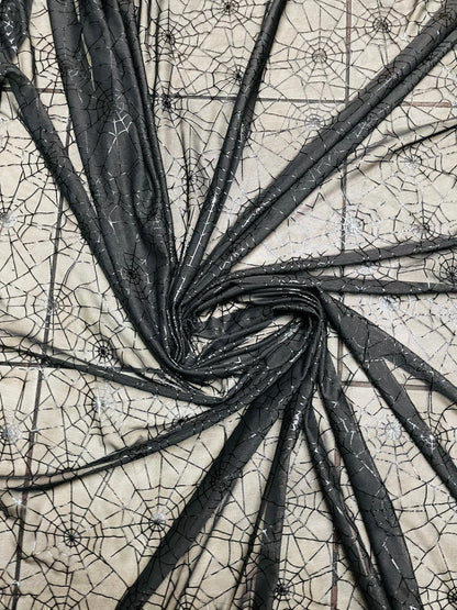 Spiderweb design metallic print on great quality of nylon power mesh 4-way stretch 58/60” Sold by the YD. Ships Worldwide from Los Angeles