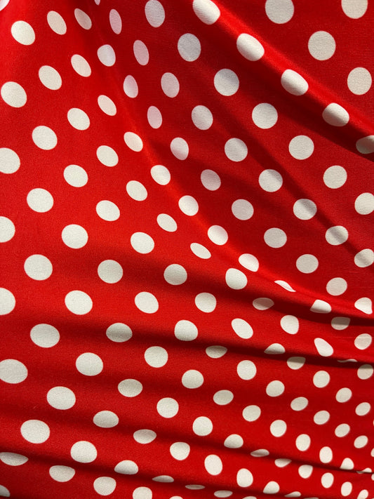 New spandex polka dots Design Red/white 4 way stretch poly spandex 58/60” Sold by the YD. Ships worldwide from Los Angeles California USA.