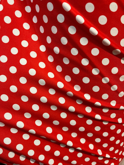 New spandex polka dots Design Red/white 4 way stretch poly spandex 58/60” Sold by the YD. Ships worldwide from Los Angeles California USA.