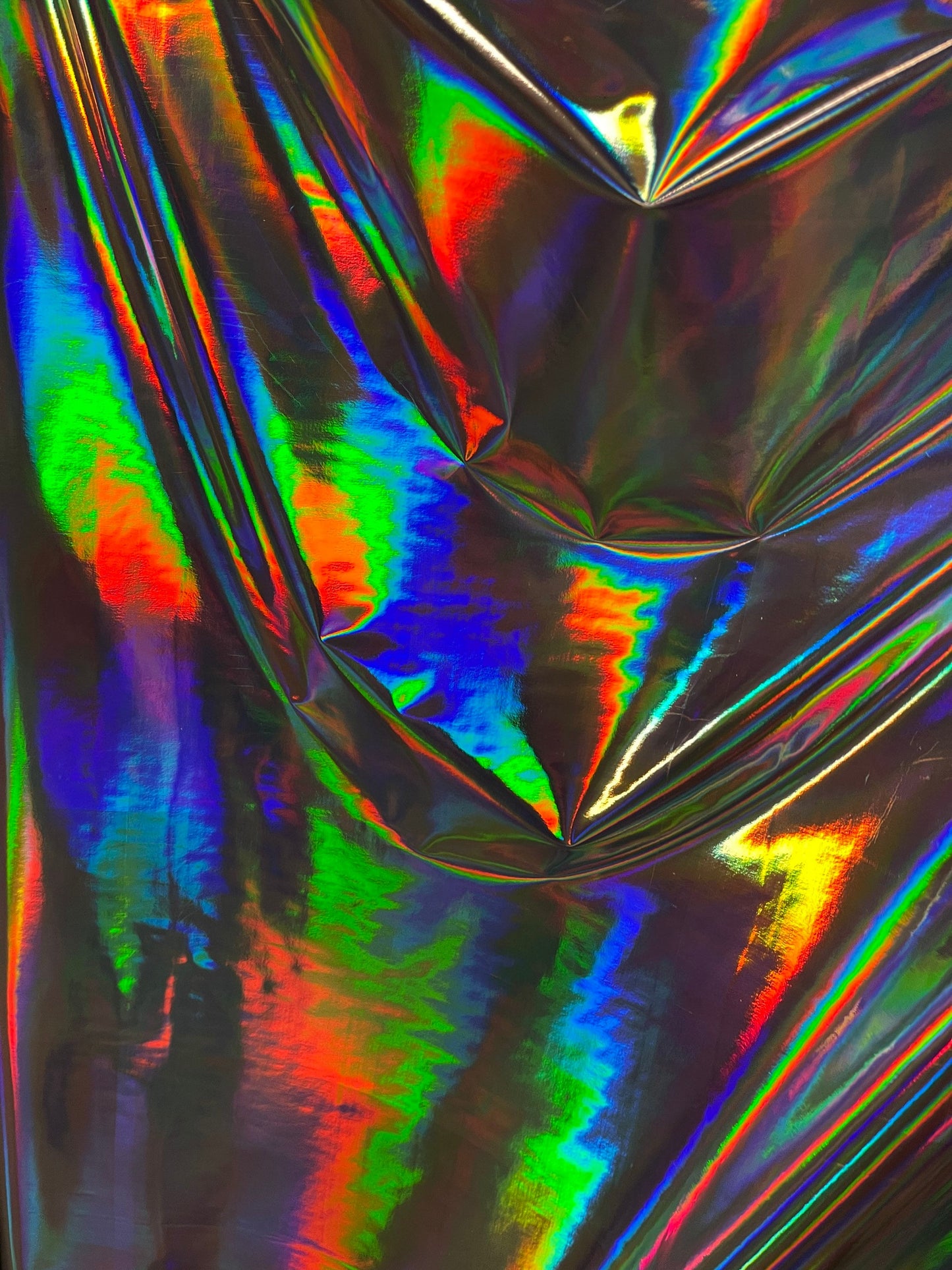 New Iridescent silver Mirror vinyl super shiny 2-way stretch 58/60” Sold by the YD. Ships Worldwide from Los Angeles California USA.