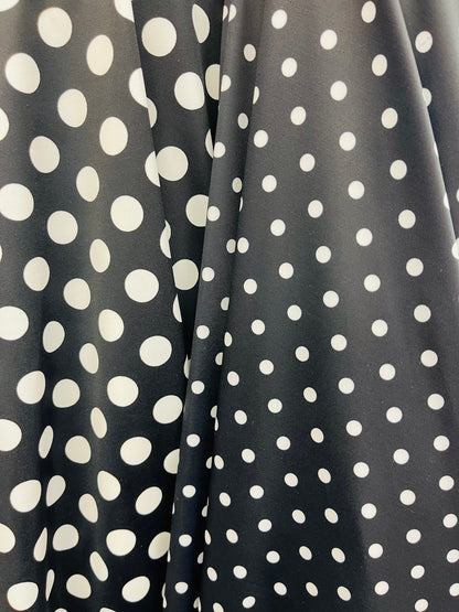 Polka dots design print on best quality of nylon spandex 4-way stretch 58/60” Sold by the YD. Ships Worldwide from Los Ángeles California