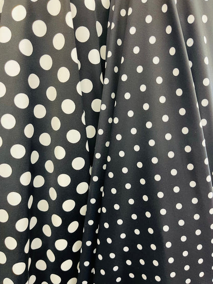Polka dots design print on best quality of nylon spandex 4-way stretch 58/60” Sold by the YD. Ships Worldwide from Los Ángeles California