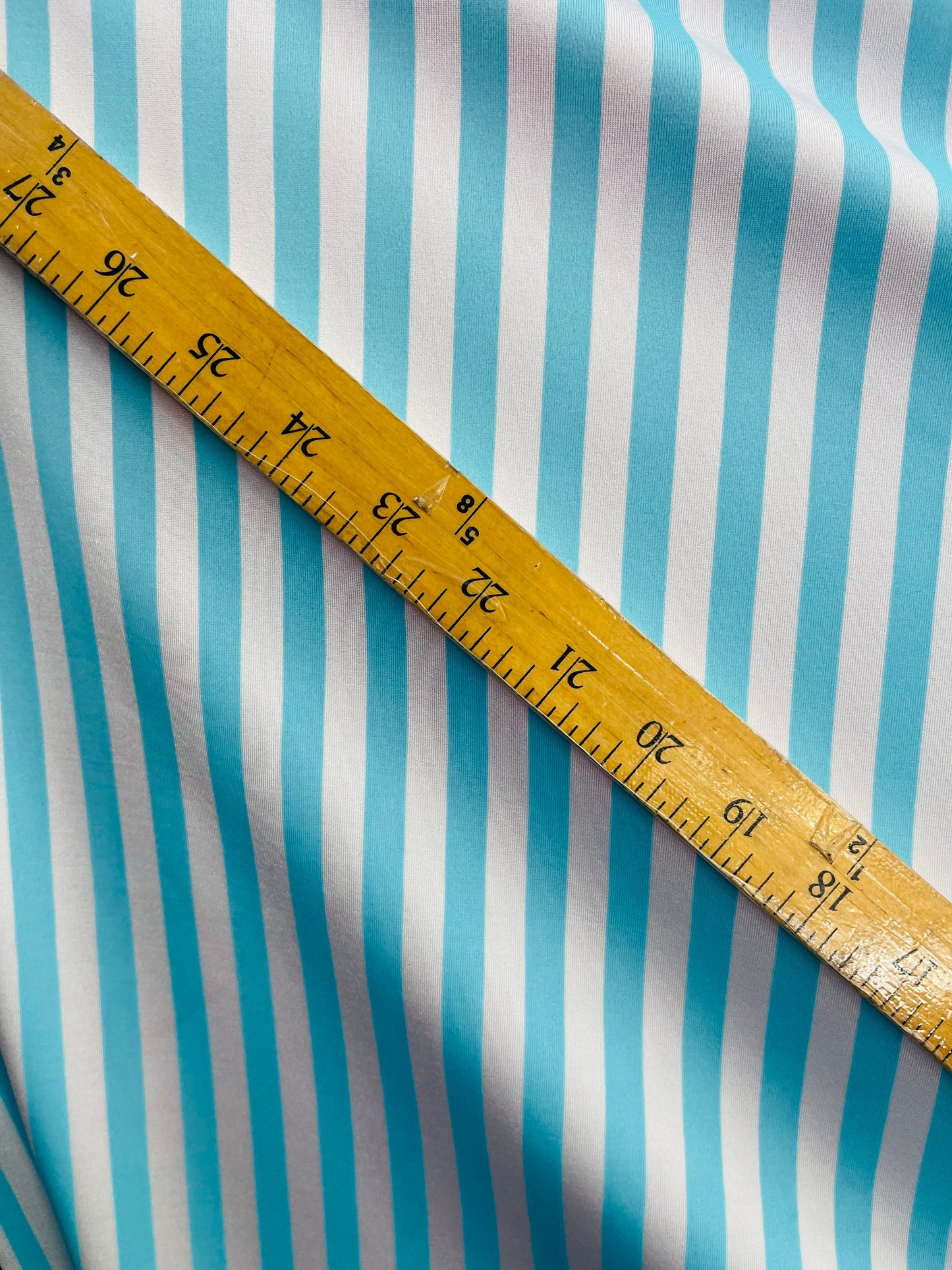 Stripes design Tiffany/white print on best quality of nylon spandex 4-way stretch 58/60” Sold by the YD. Ships Worldwide from Los Angeles CA