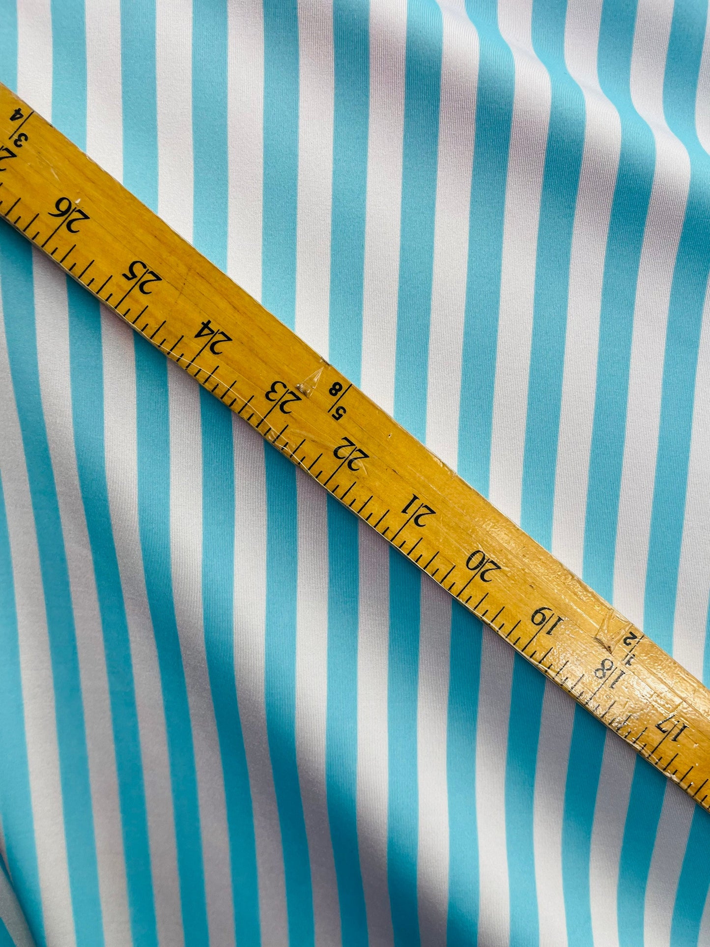 Stripes design Tiffany/white print on best quality of nylon spandex 4-way stretch 58/60” Sold by the YD. Ships Worldwide from Los Angeles CA