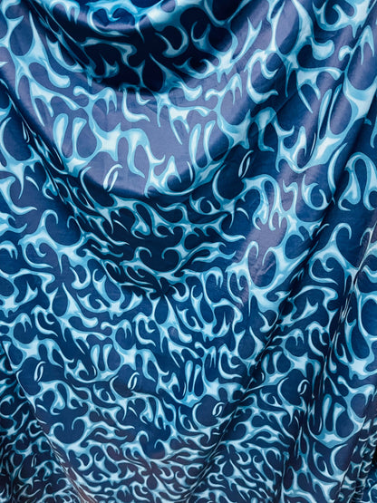 New Modern abstract flames design Blue color print on best quality of nylon spandex 4-way stretch 58/60” Sold by the YD. Ships Worldwide