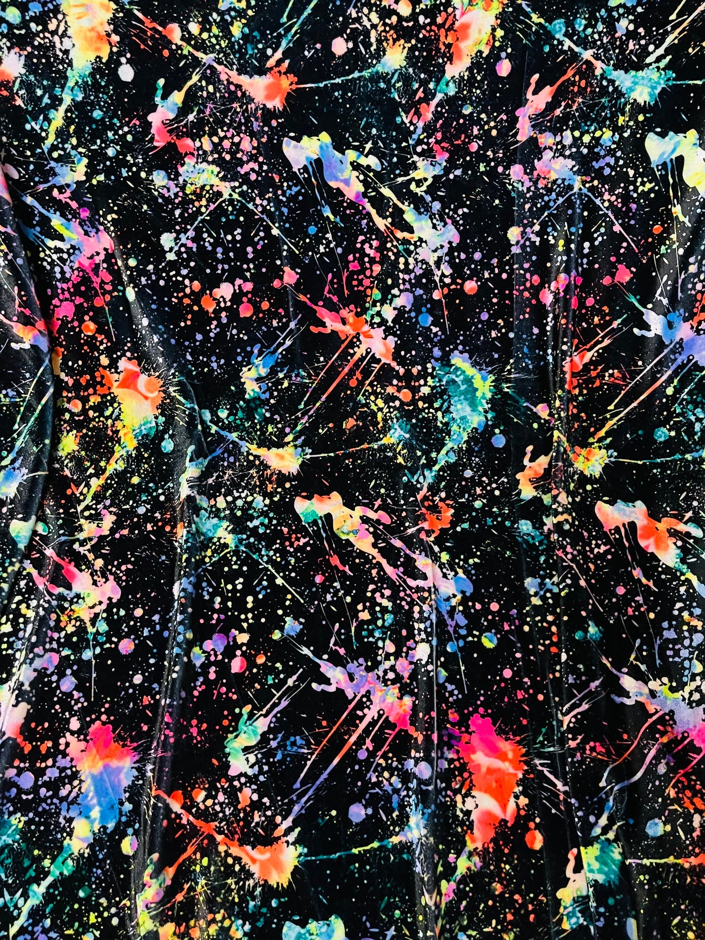 New splatter paint design Black/Multicolor print on best quality of stretch velvet 4-way stretch 58/60” Sold by the YD. Ships worldwide