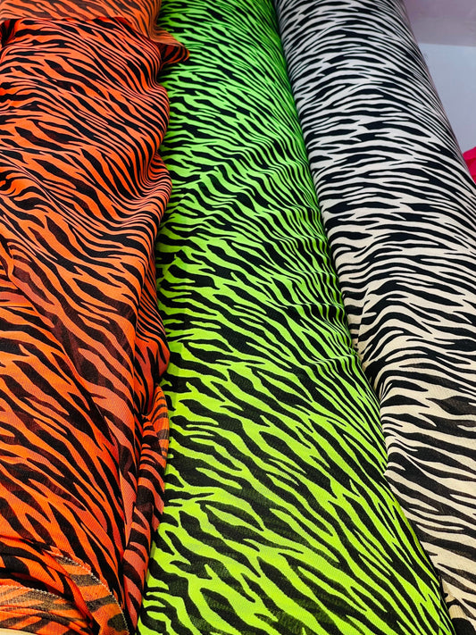New Exotic Zebra design print on great quality of stretch mesh 4-way 58/60” Sold by the YD. Ships Worldwide from Los Angeles California USA.