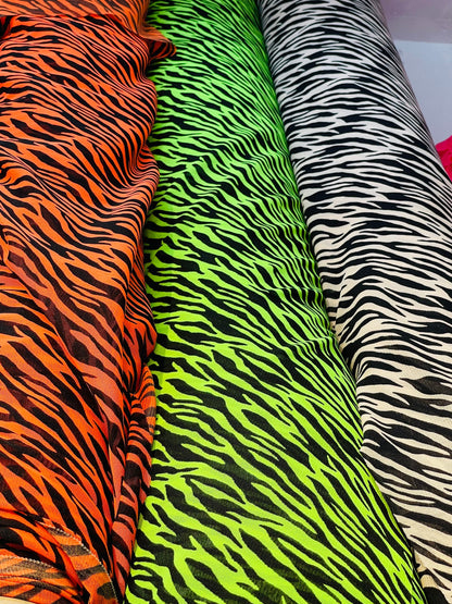 New Exotic Zebra design print on great quality of stretch mesh 4-way 58/60” Sold by the YD. Ships Worldwide from Los Angeles California USA.