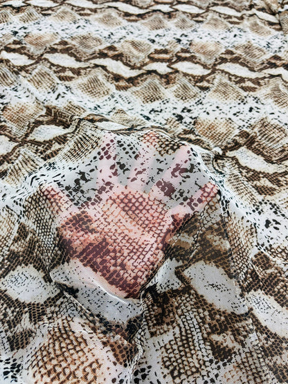 Exotic Snake design print of great quality of nylon power mesh 4-way stretch 58/60” Sold by the YD. Ships Worldwide from Los Angeles CA.