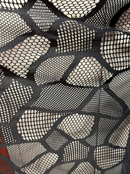 New Spiderweb multi design black mesh 4-way stretch 50/52” Sold by the YD. Ships Worldwide from Los Angeles California USA.