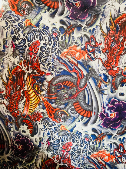 New Exotic Tattoo Dragon design Multicolor print on best quality of Nylon Spandex 4-way stretch 58/60” Sold by the YD. Ships Worldwide