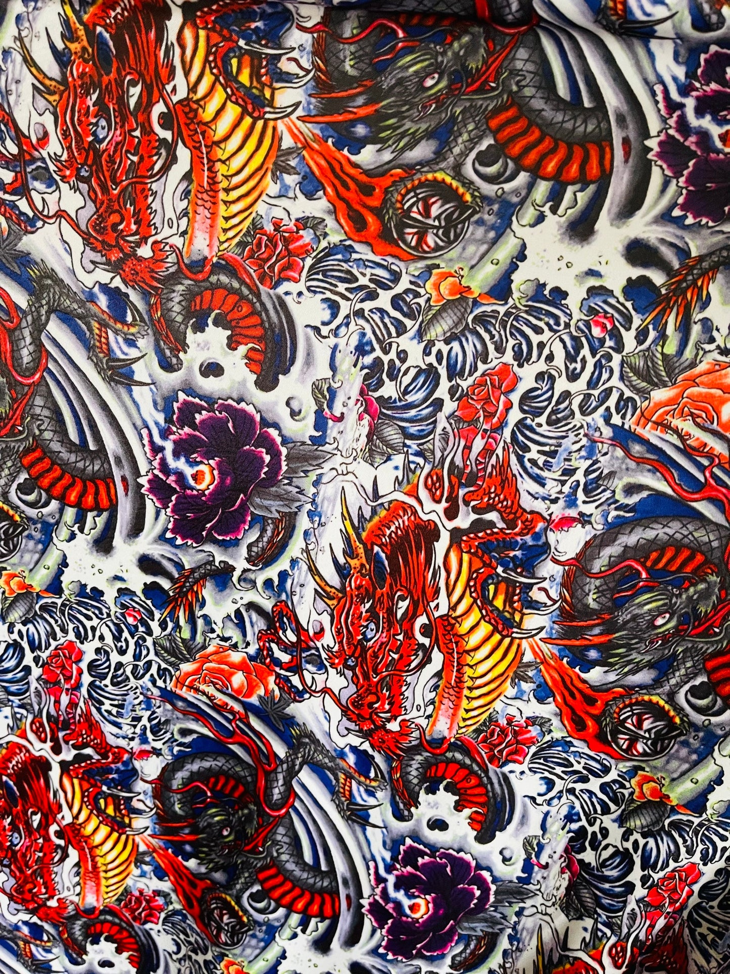 New Exotic Tattoo Dragon design Multicolor print on best quality of Nylon Spandex 4-way stretch 58/60” Sold by the YD. Ships Worldwide