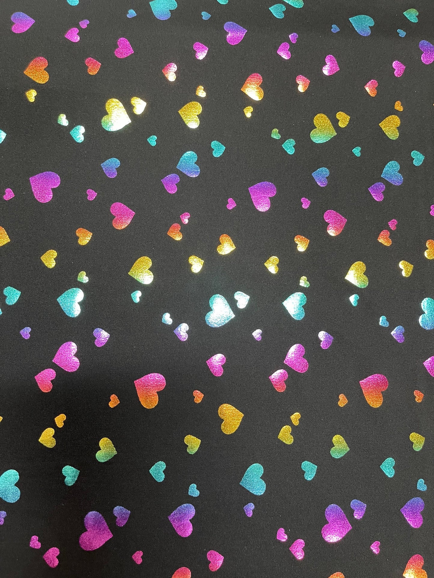 New Hearts design Black/Rainbow print on Nylon spandex 4-way stretch 58/60” Sold by the YD. Ships Worldwide from Los Angeles California USA.