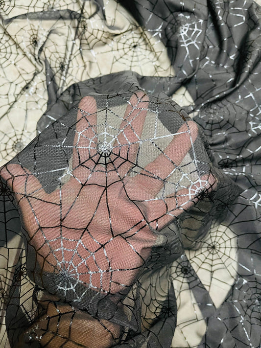 Spiderweb design metallic print on great quality of nylon power mesh 4-way stretch 58/60” Sold by the YD. Ships Worldwide from Los Angeles