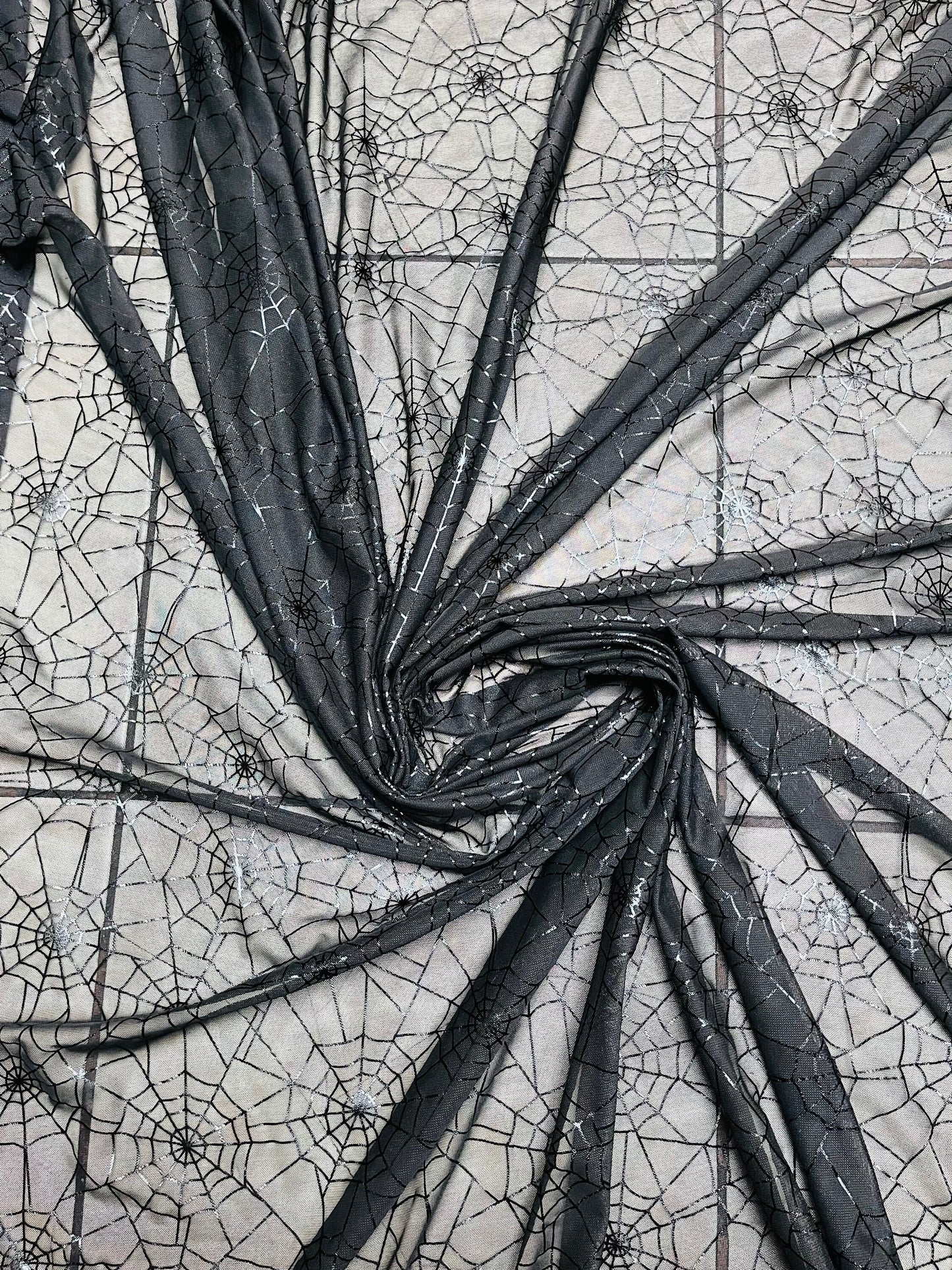 Spiderweb design metallic print on great quality of nylon power mesh 4-way stretch 58/60” Sold by the YD. Ships Worldwide from Los Angeles