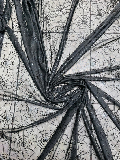 Spiderweb design metallic print on great quality of nylon power mesh 4-way stretch 58/60” Sold by the YD. Ships Worldwide from Los Angeles