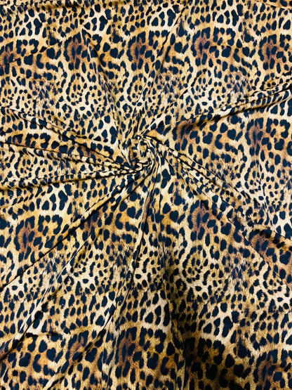 Jaguar Design Exotic animal print on best quality of nylon spandex 4-way stretch 58/60” Sold by the YD. Ships Worldwide from Los Angeles CA