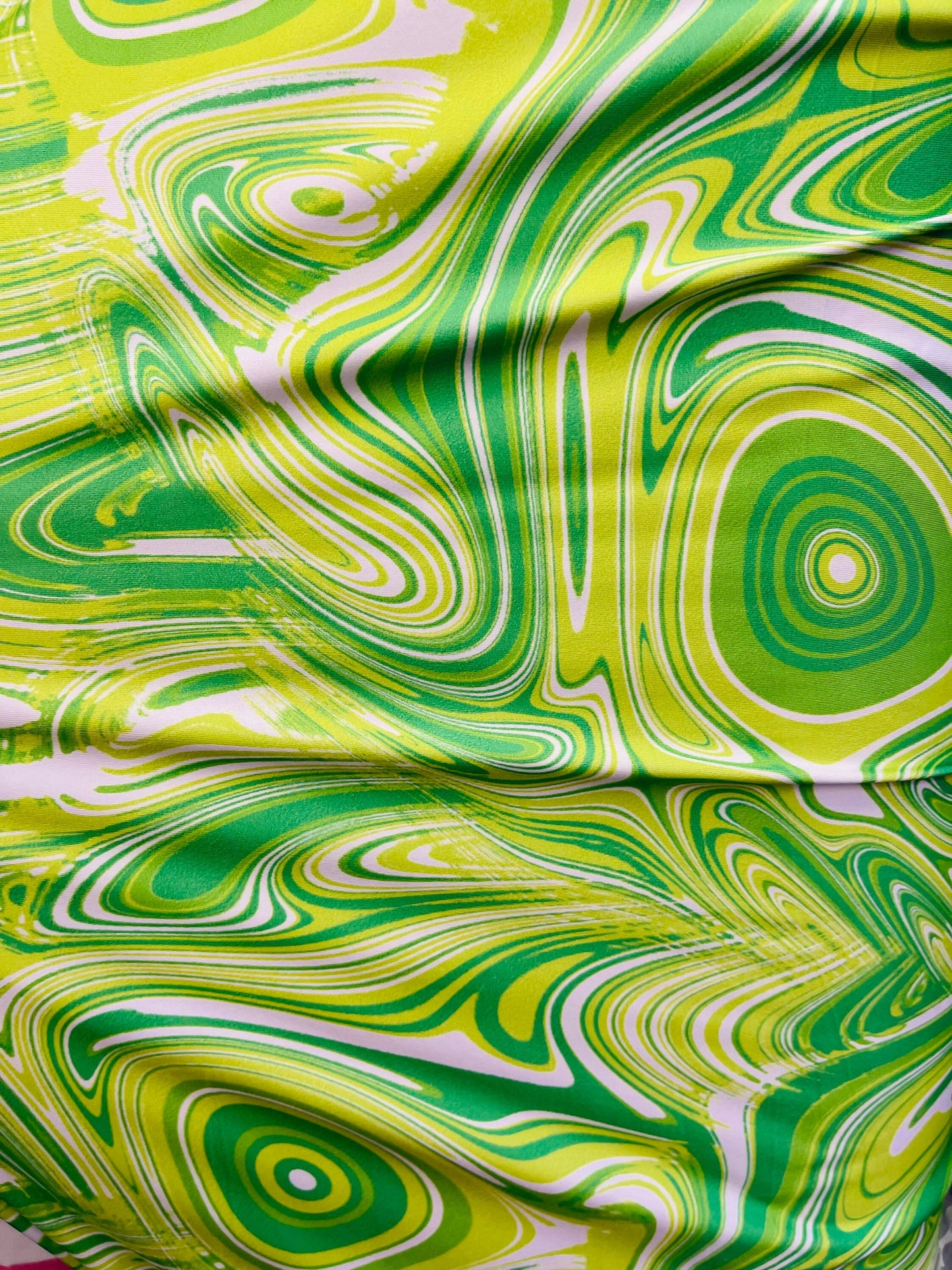 New abstract Lava design print on great quality of poly  spandex green/yellow 4-way stretch 58/60” Sold by the YD. Ships Worldwide from L.A