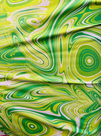 New abstract Lava design print on great quality of poly  spandex green/yellow 4-way stretch 58/60” Sold by the YD. Ships Worldwide from L.A