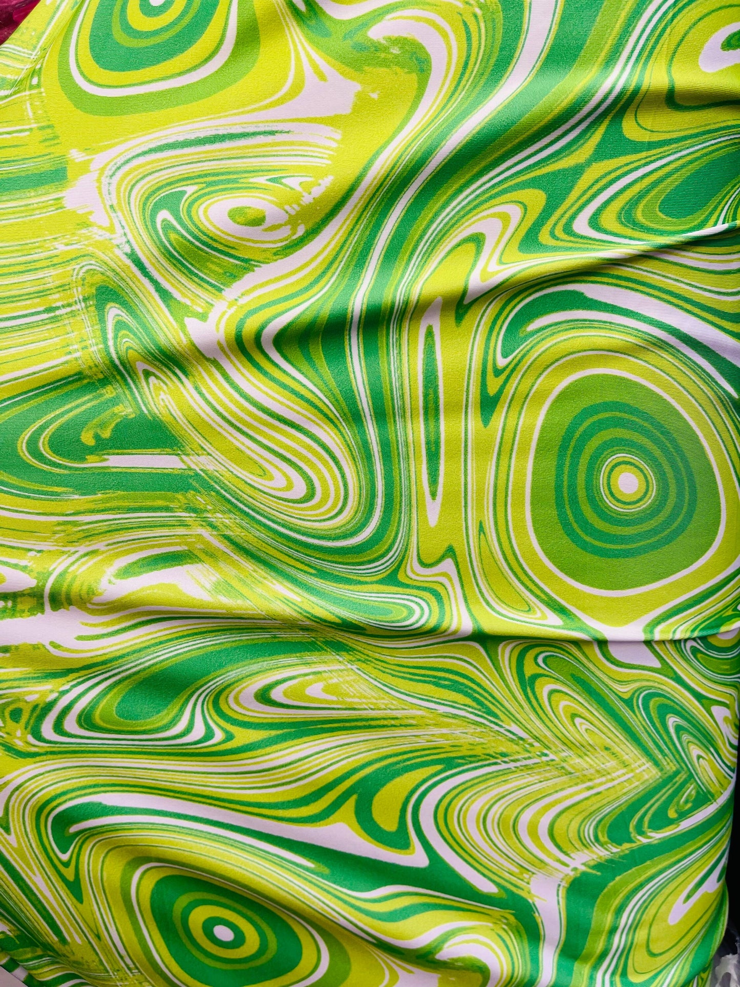 New abstract Lava design print on great quality of poly  spandex green/yellow 4-way stretch 58/60” Sold by the YD. Ships Worldwide from L.A