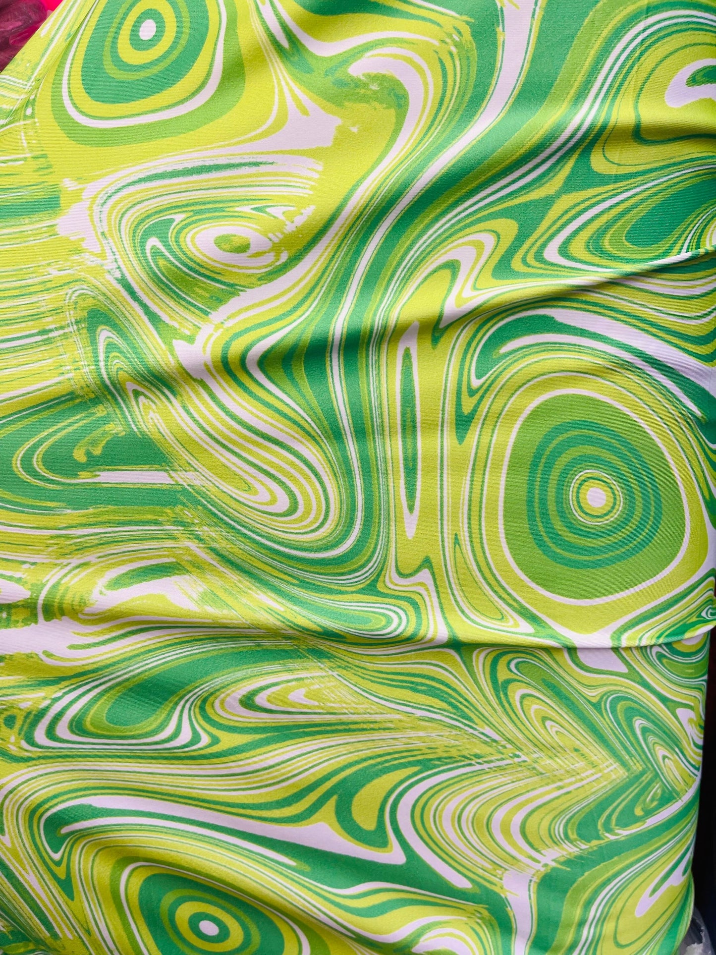 New abstract Lava design print on great quality of poly  spandex green/yellow 4-way stretch 58/60” Sold by the YD. Ships Worldwide from L.A