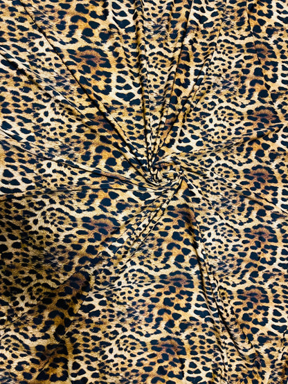 Jaguar Design Exotic animal print on best quality of nylon spandex 4-way stretch 58/60” Sold by the YD. Ships Worldwide from Los Angeles CA