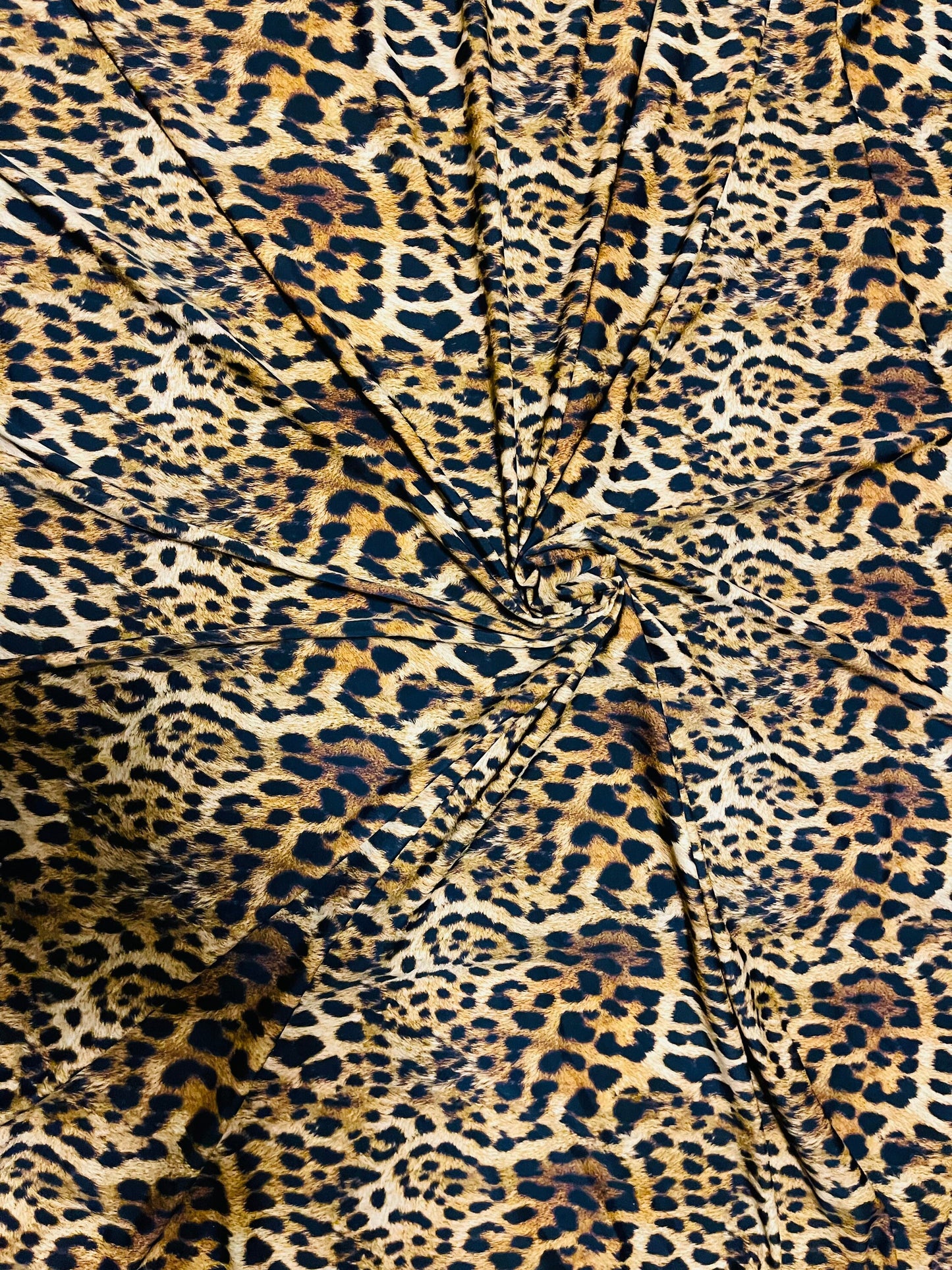 Jaguar Design Exotic animal print on best quality of nylon spandex 4-way stretch 58/60” Sold by the YD. Ships Worldwide from Los Angeles CA