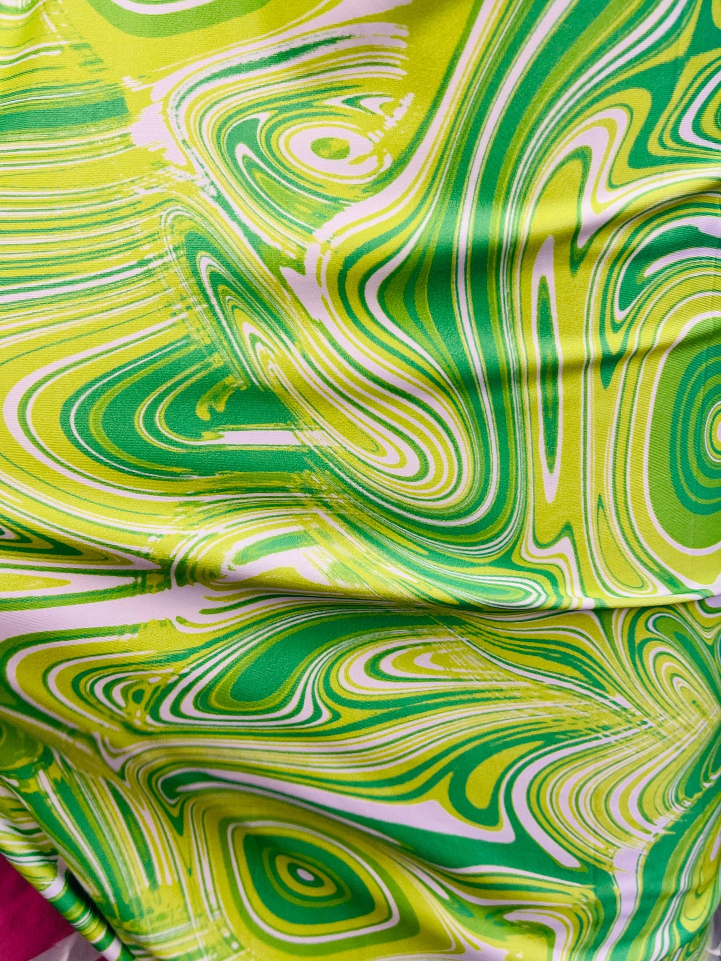 New abstract Lava design print on great quality of poly  spandex green/yellow 4-way stretch 58/60” Sold by the YD. Ships Worldwide from L.A