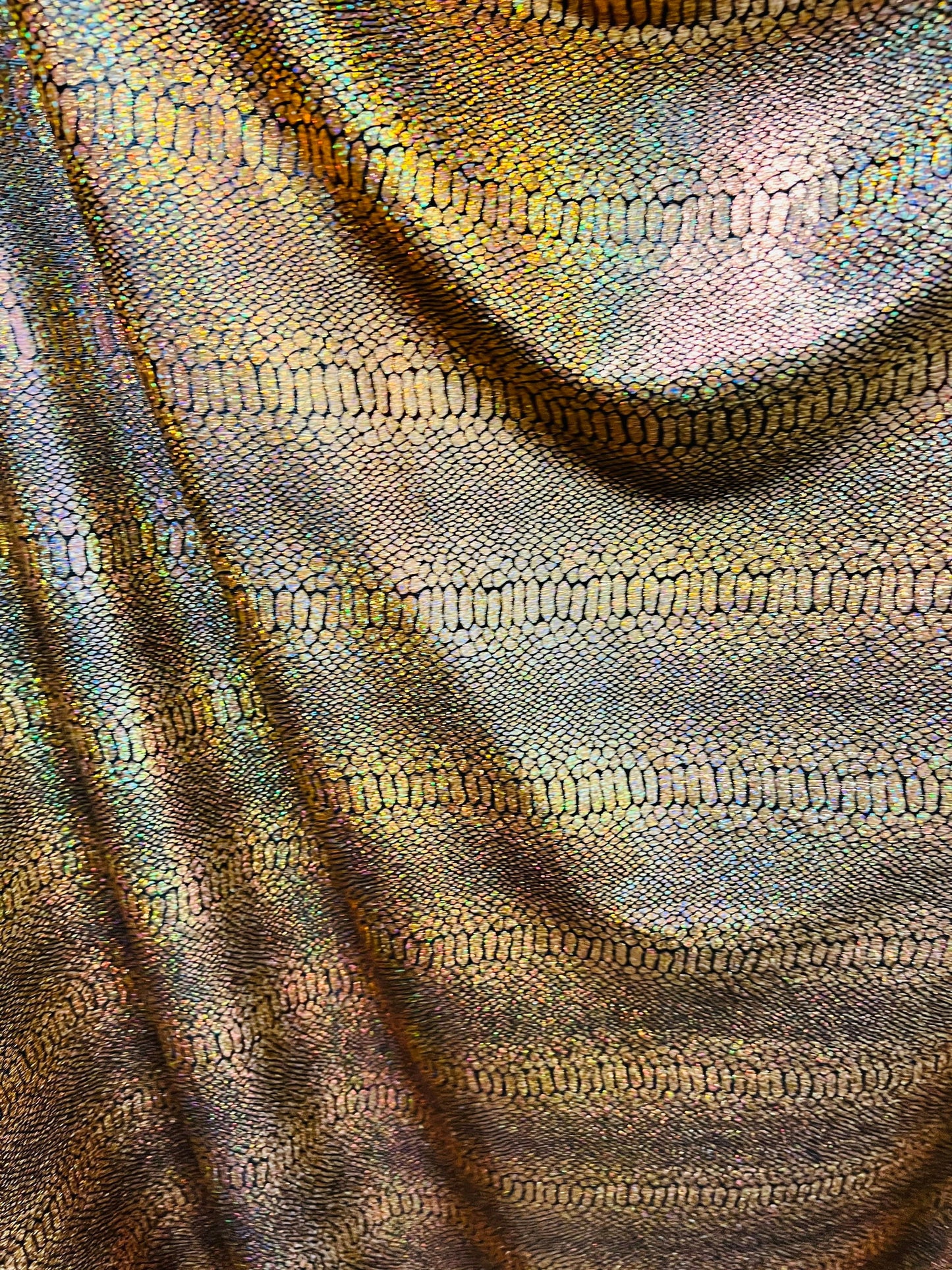 Exotic Snake design metallic poly spandex fabric 4-way stretch 58/60” Sold by the YD. Ships worldwide from Los Angeles California USA
