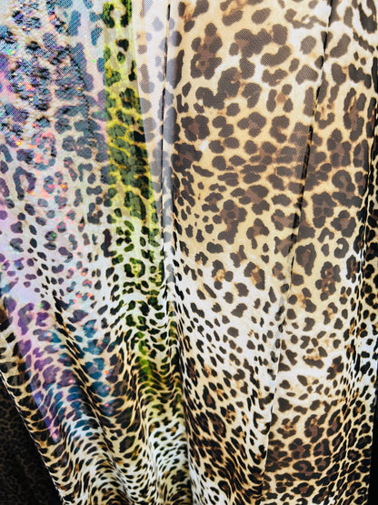 Leopard design print on great quality of power mesh 4-way stretch 58/60” Sold by the YD. Ships worldwide from Los Angeles California USA.