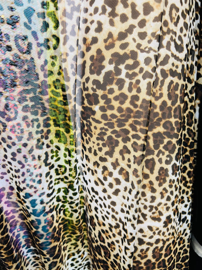 Leopard design print on great quality of power mesh 4-way stretch 58/60” Sold by the YD. Ships worldwide from Los Angeles California USA.