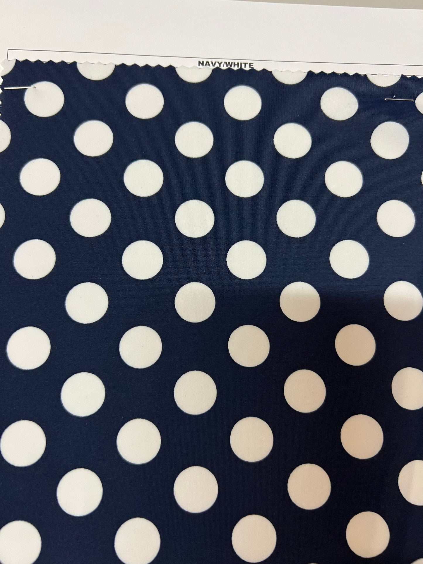 Polka dots design print on best quality of Matte nylon spandex 4-way stretch 58/60” Sold by the YD. Ships worldwide from Los Angeles CA USA.