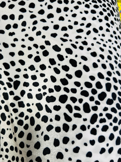 Dalmatian design print on best quality of stretch velvet 4-way stretch 58/60” Sold by the YD. Ships worldwide from Los Angeles California US