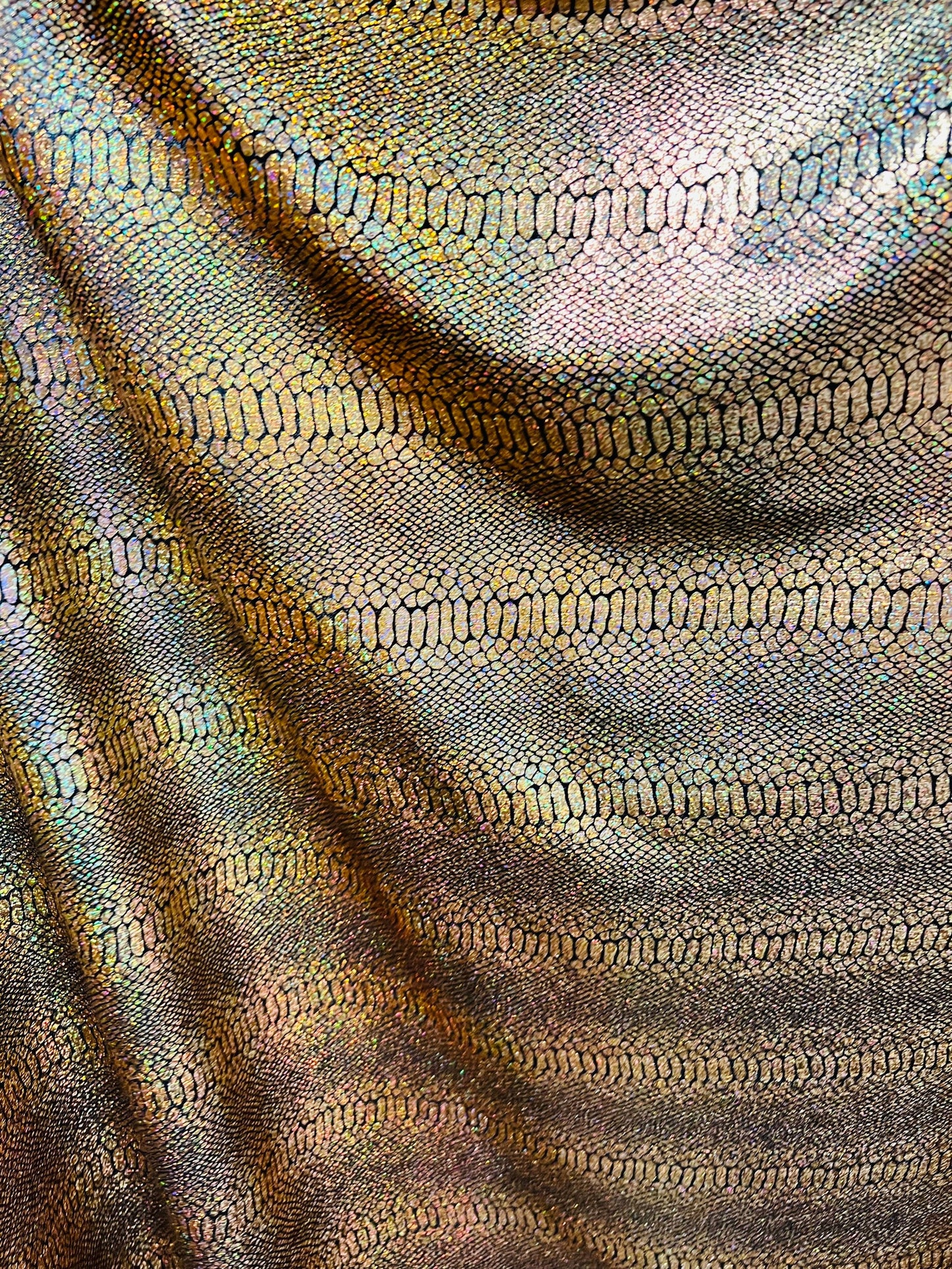 Exotic Snake design metallic poly spandex fabric 4-way stretch 58/60” Sold by the YD. Ships worldwide from Los Angeles California USA