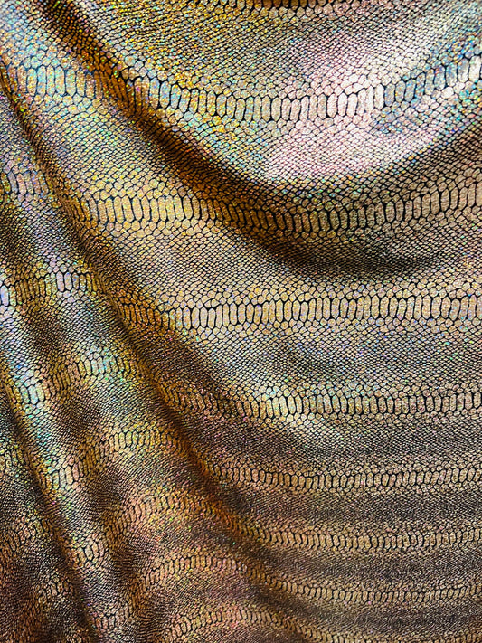 Exotic Snake design metallic poly spandex fabric 4-way stretch 58/60” Sold by the YD. Ships worldwide from Los Angeles California USA