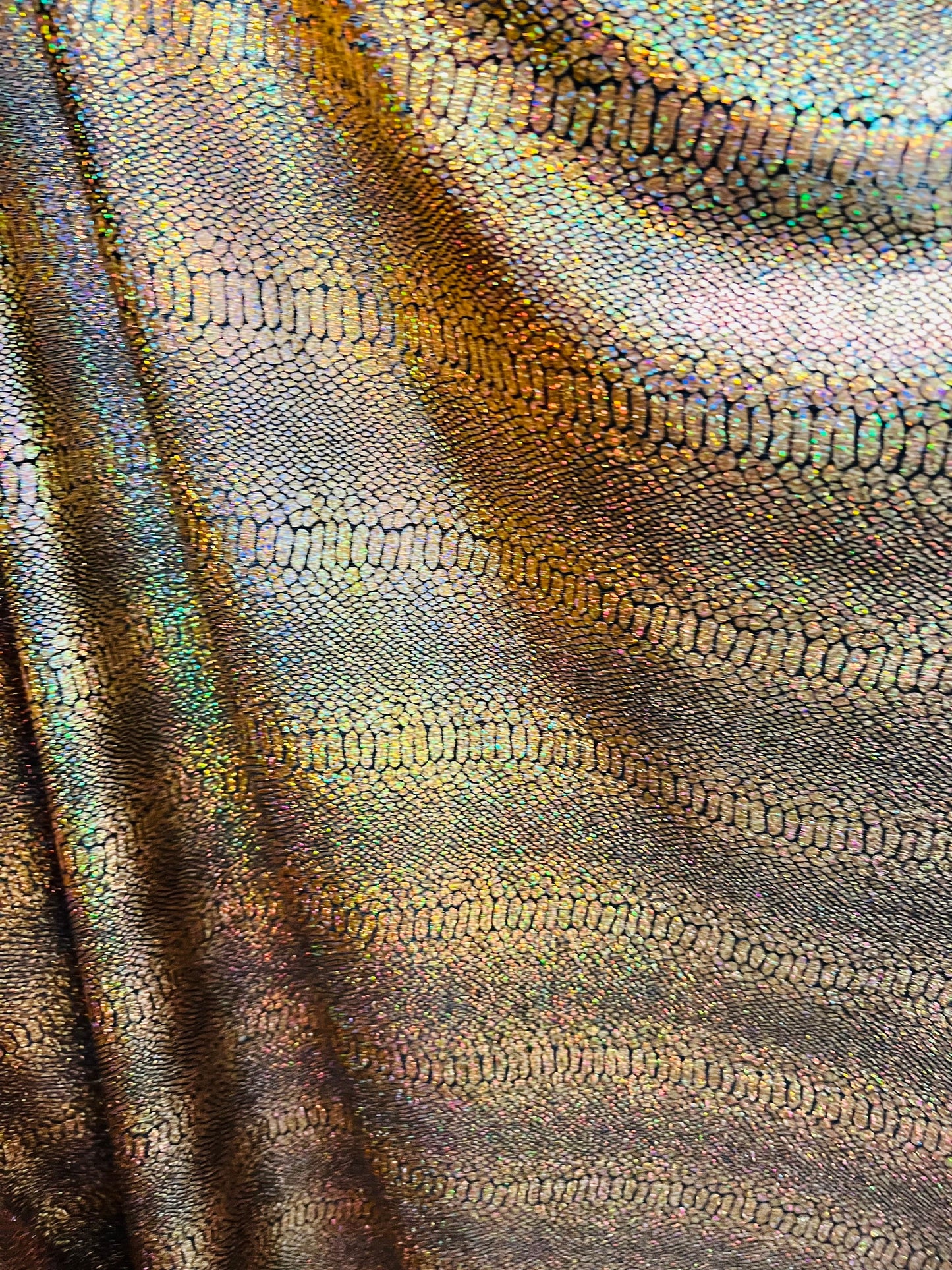 Exotic Snake design metallic poly spandex fabric 4-way stretch 58/60” Sold by the YD. Ships worldwide from Los Angeles California USA