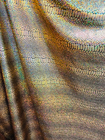 Exotic Snake design metallic poly spandex fabric 4-way stretch 58/60” Sold by the YD. Ships worldwide from Los Angeles California USA